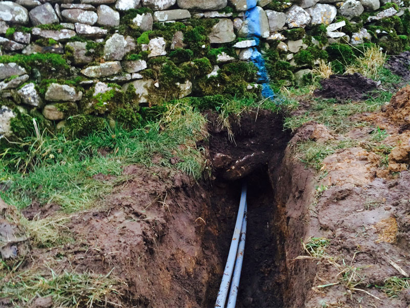 Fell End Broadband. This is how we get under walls!